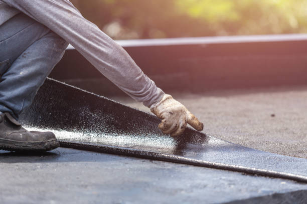 Professional Waterproofing technician working in Owenton, KY